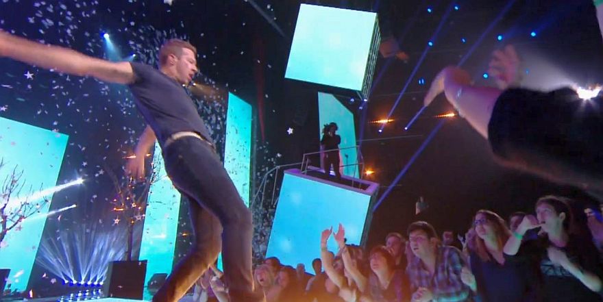 Chris Martin singing "a sky full of stars"